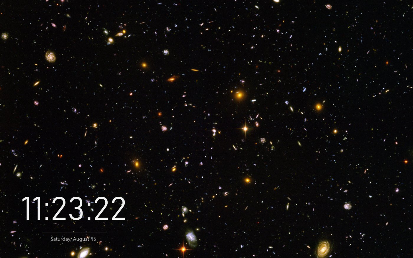 Clock set in Bahnschrift Light over the Hubble Ultra Deep Field