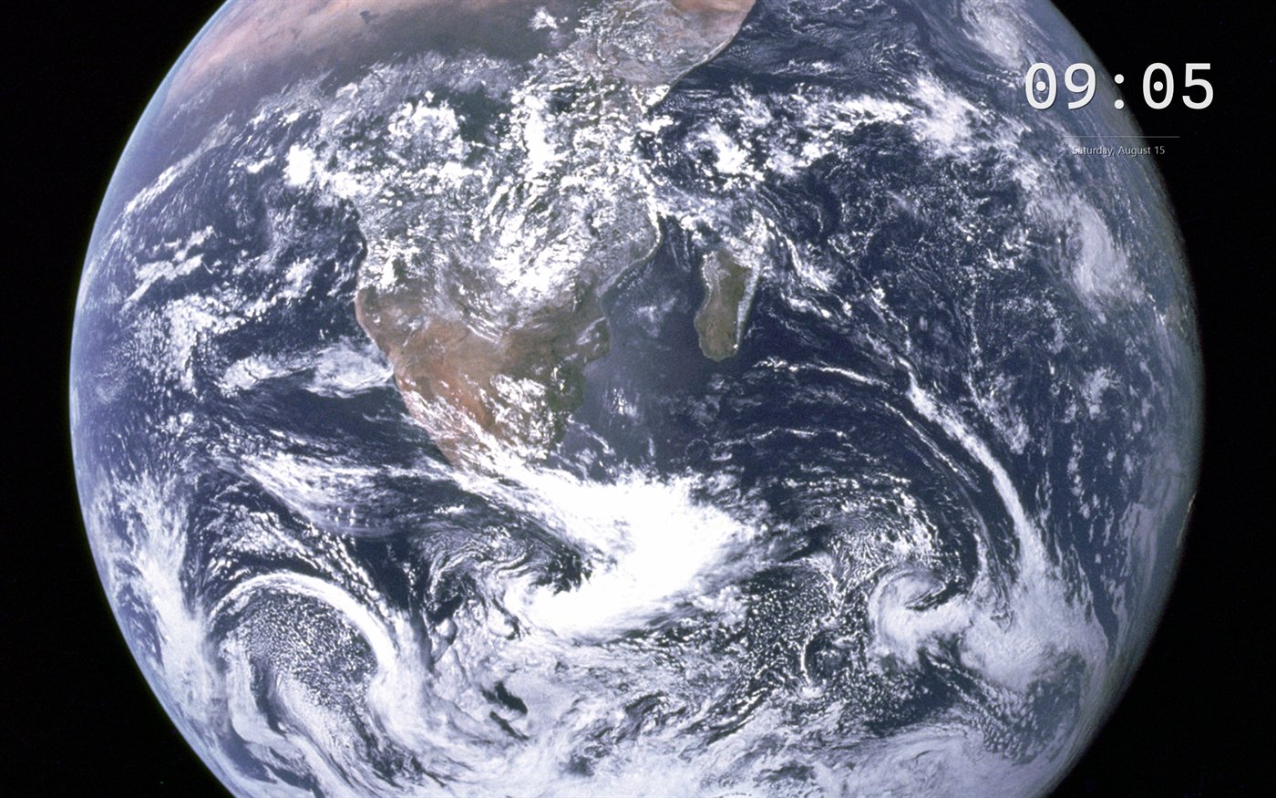 Clock set in Cascadia Mono over the Blue Marble photograph